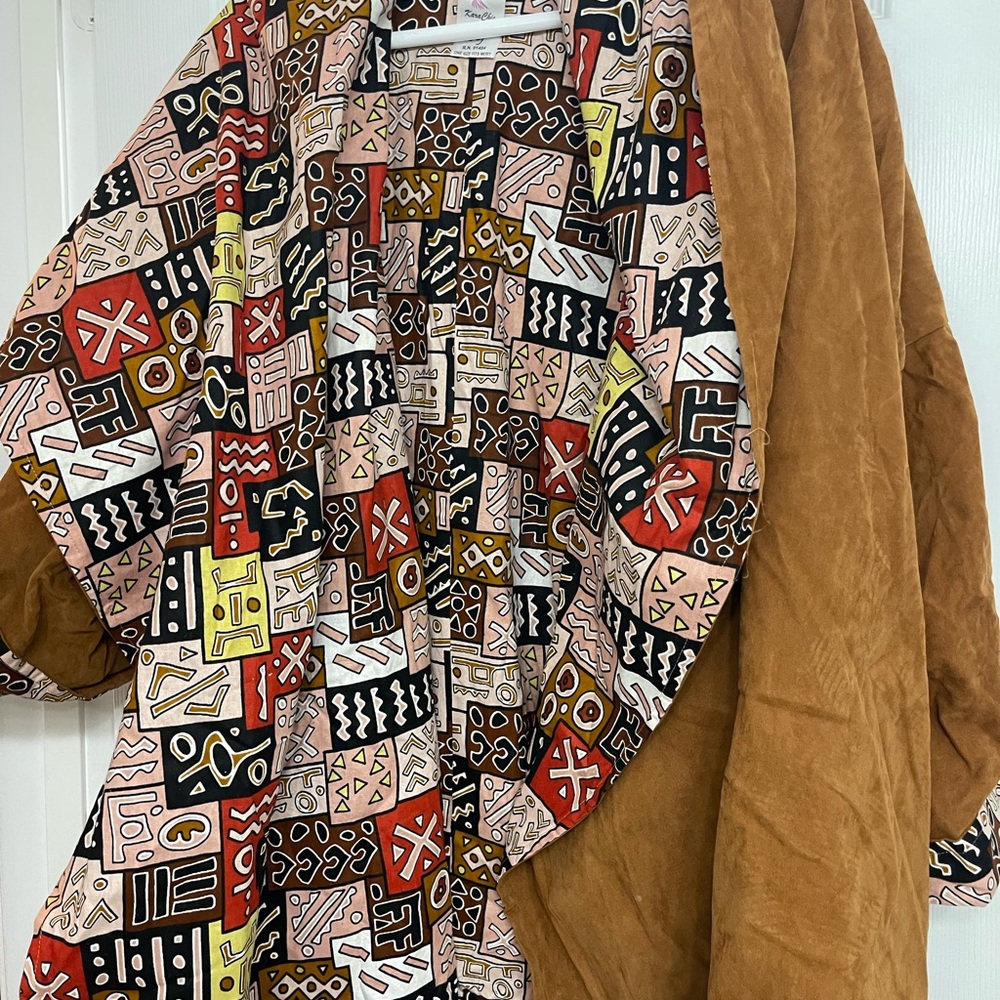 Tan Textured Cape Jacket with Beautiful African print lining.